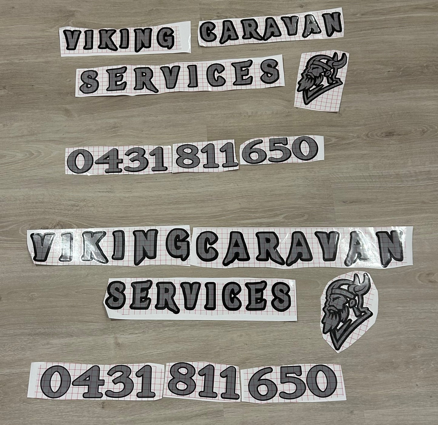 Car window decal signs for Viking Caravan Services