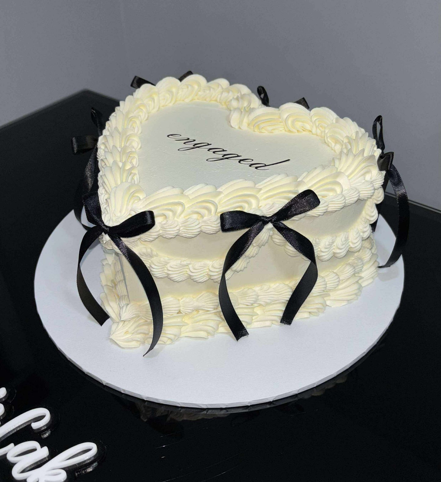 “Engaged” cake topper