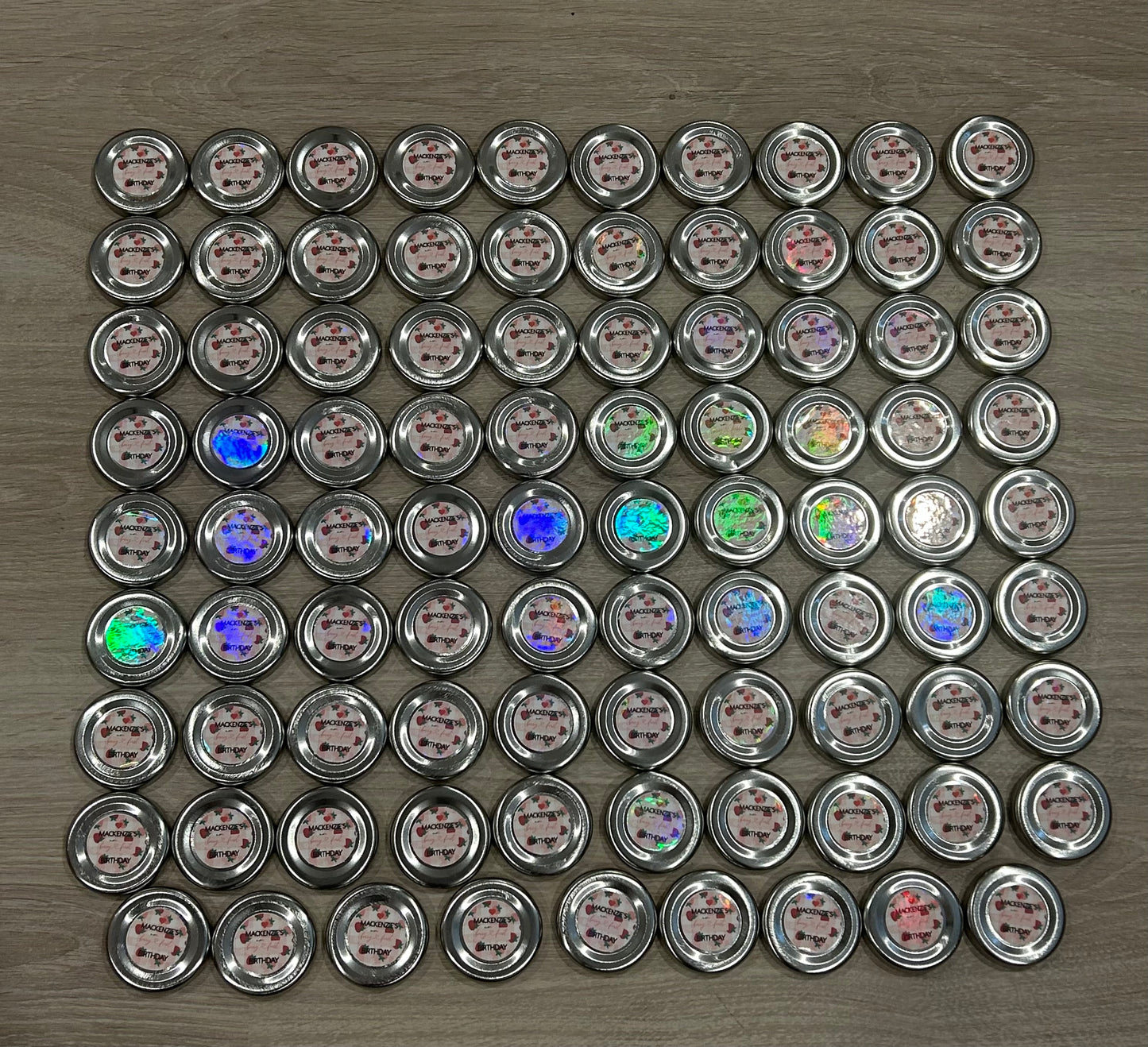 96 lids customised for a 1st birthday