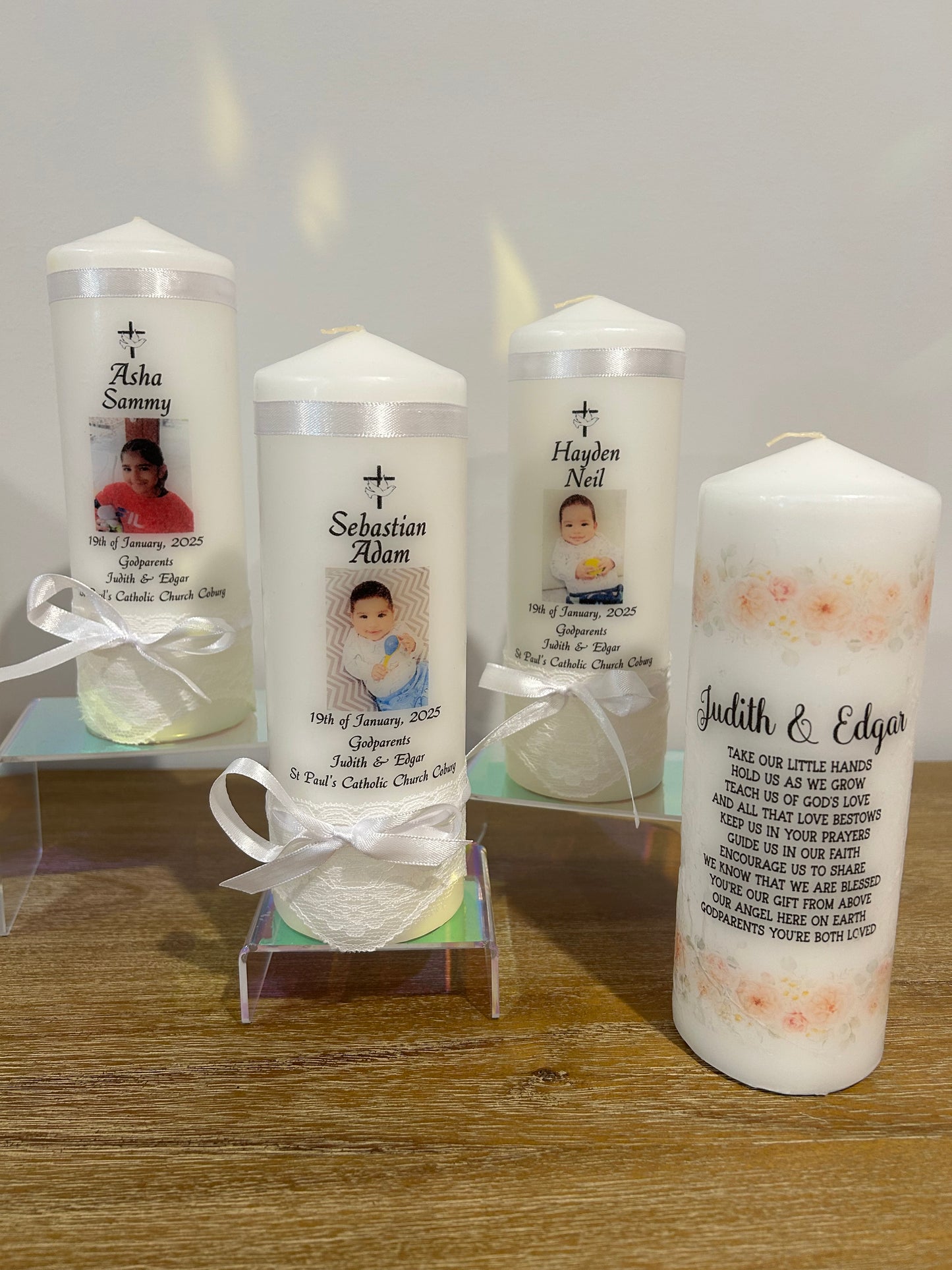 Baptism candles and a godparent candle
