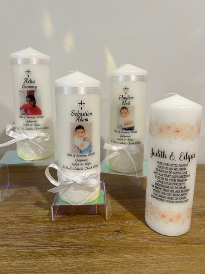 Baptism candles and a godparent candle