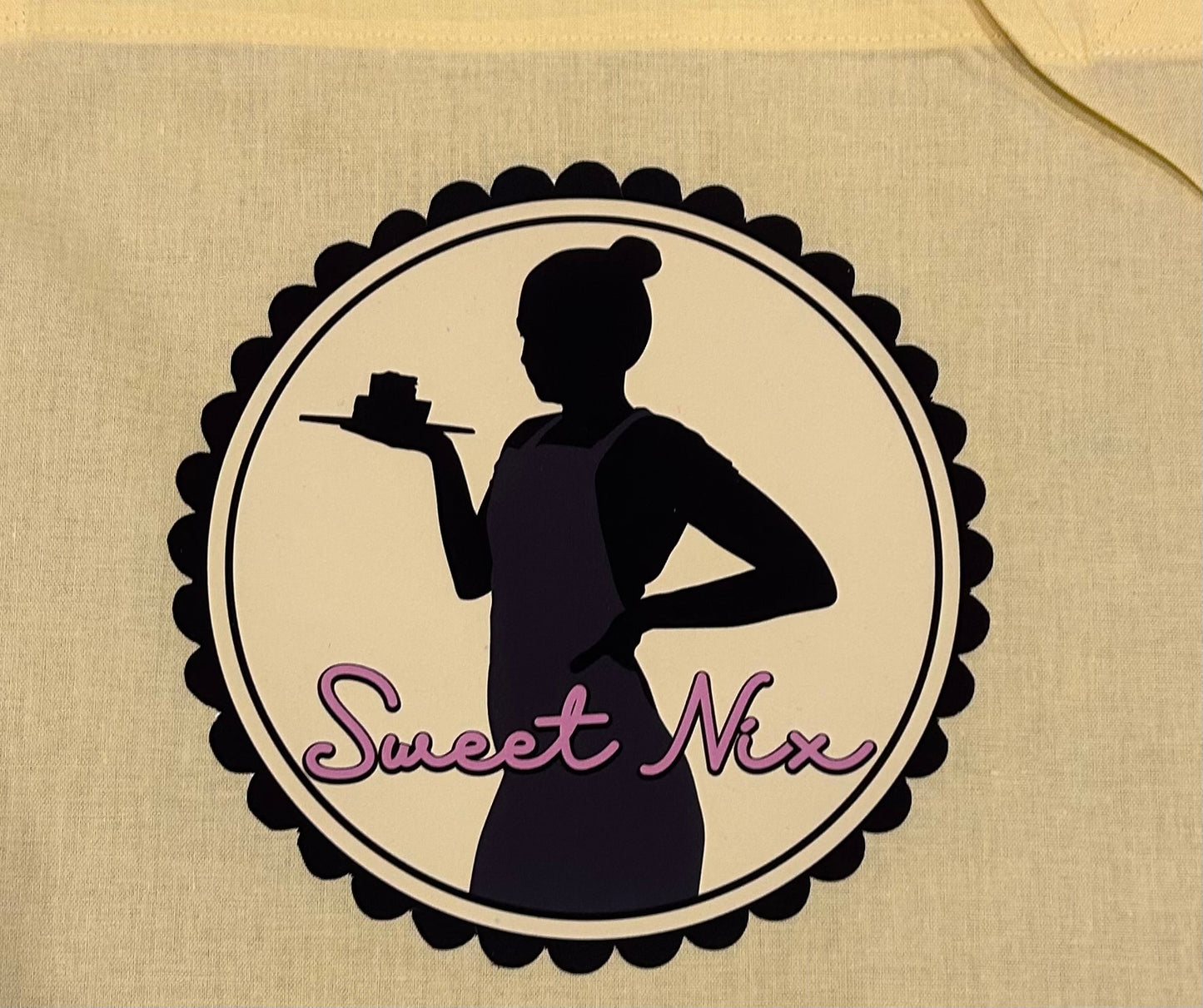 Logos added to Sweet Nix’s aprons