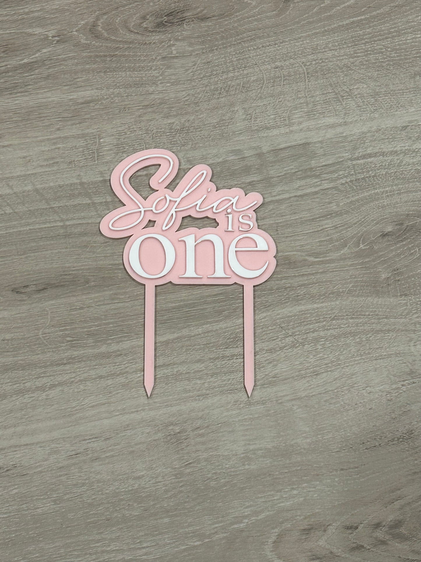 “Sofia is One” cake topper