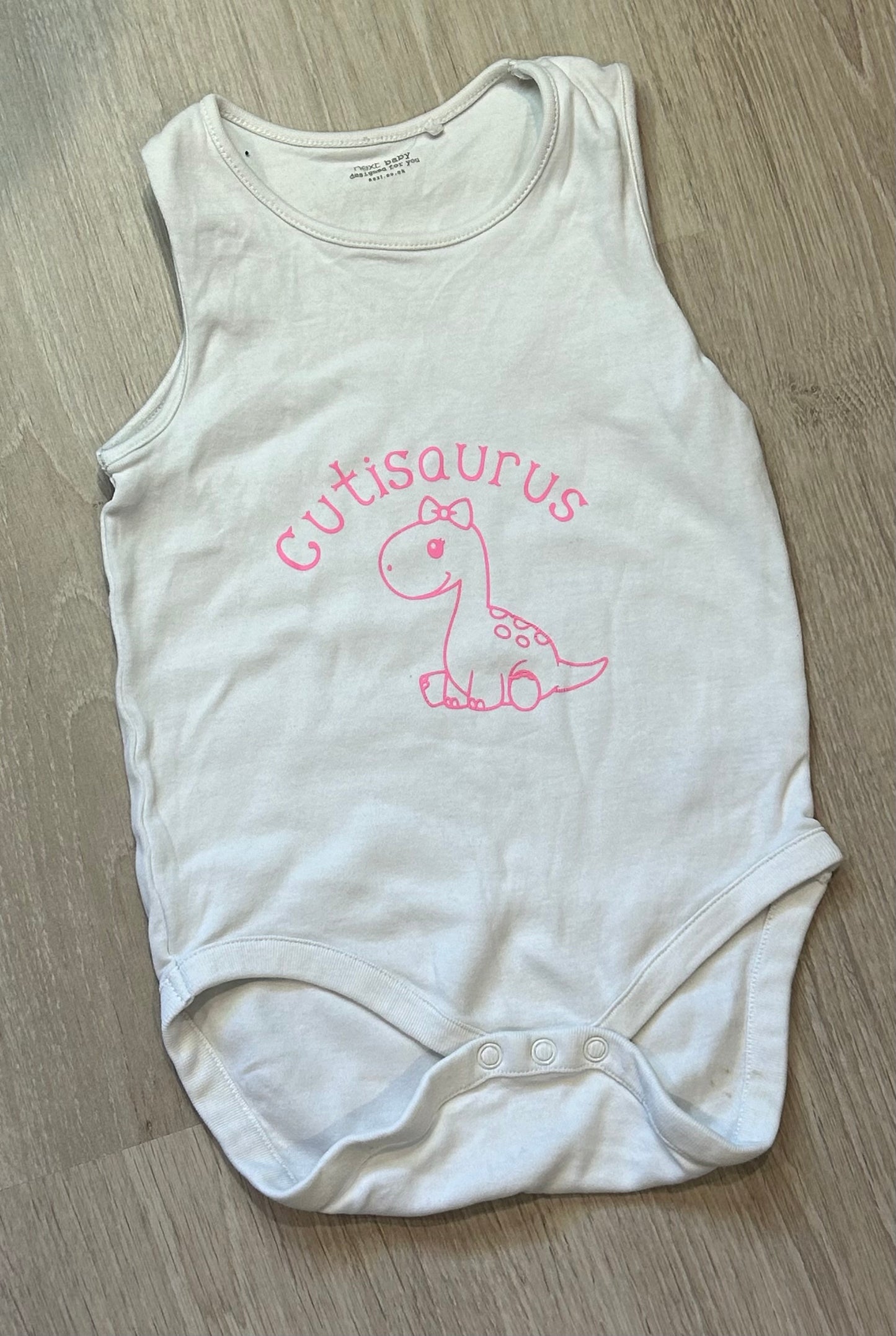 Cutisaurus onesie