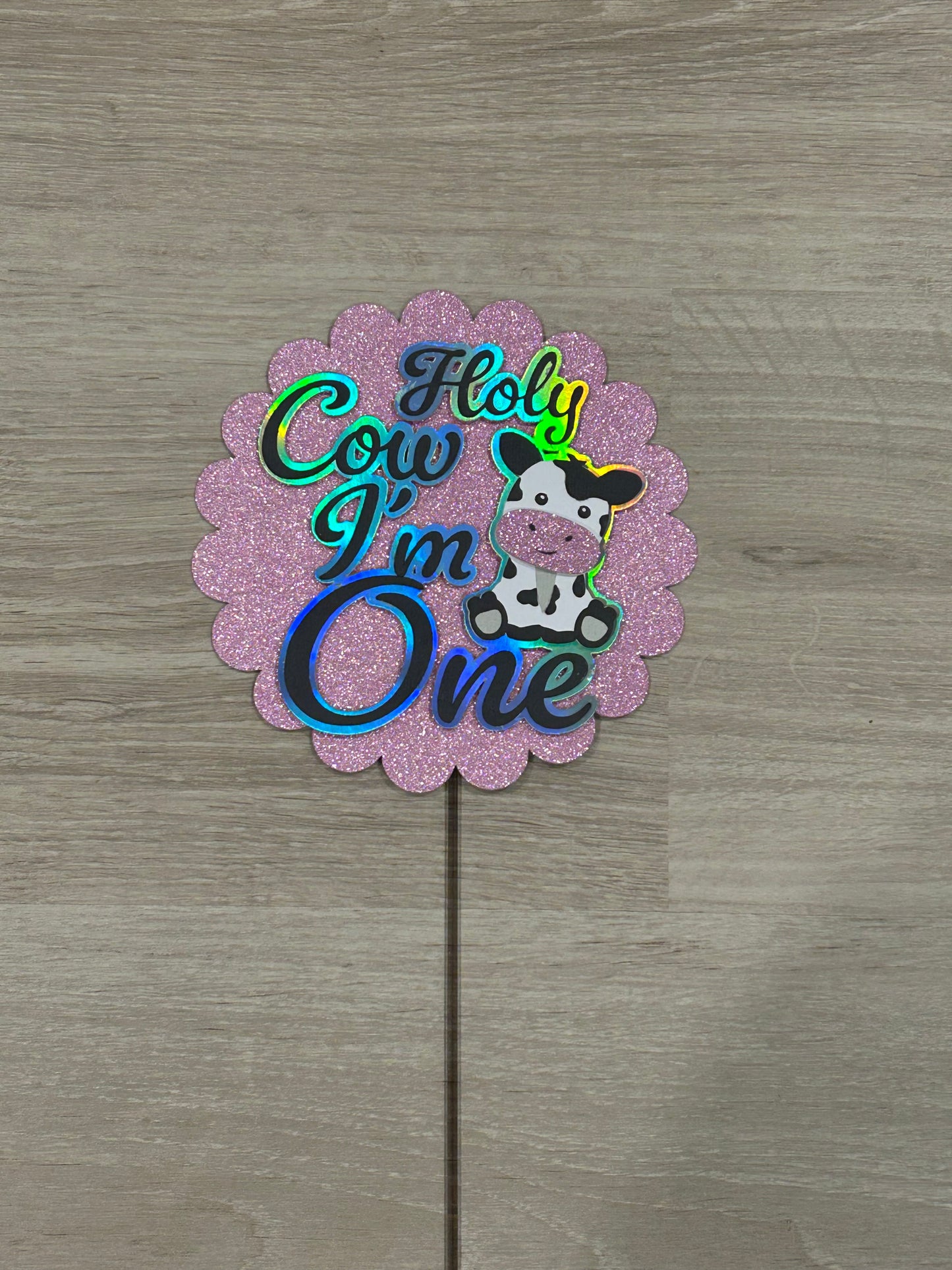 “Holy cow I’m one” cake topper