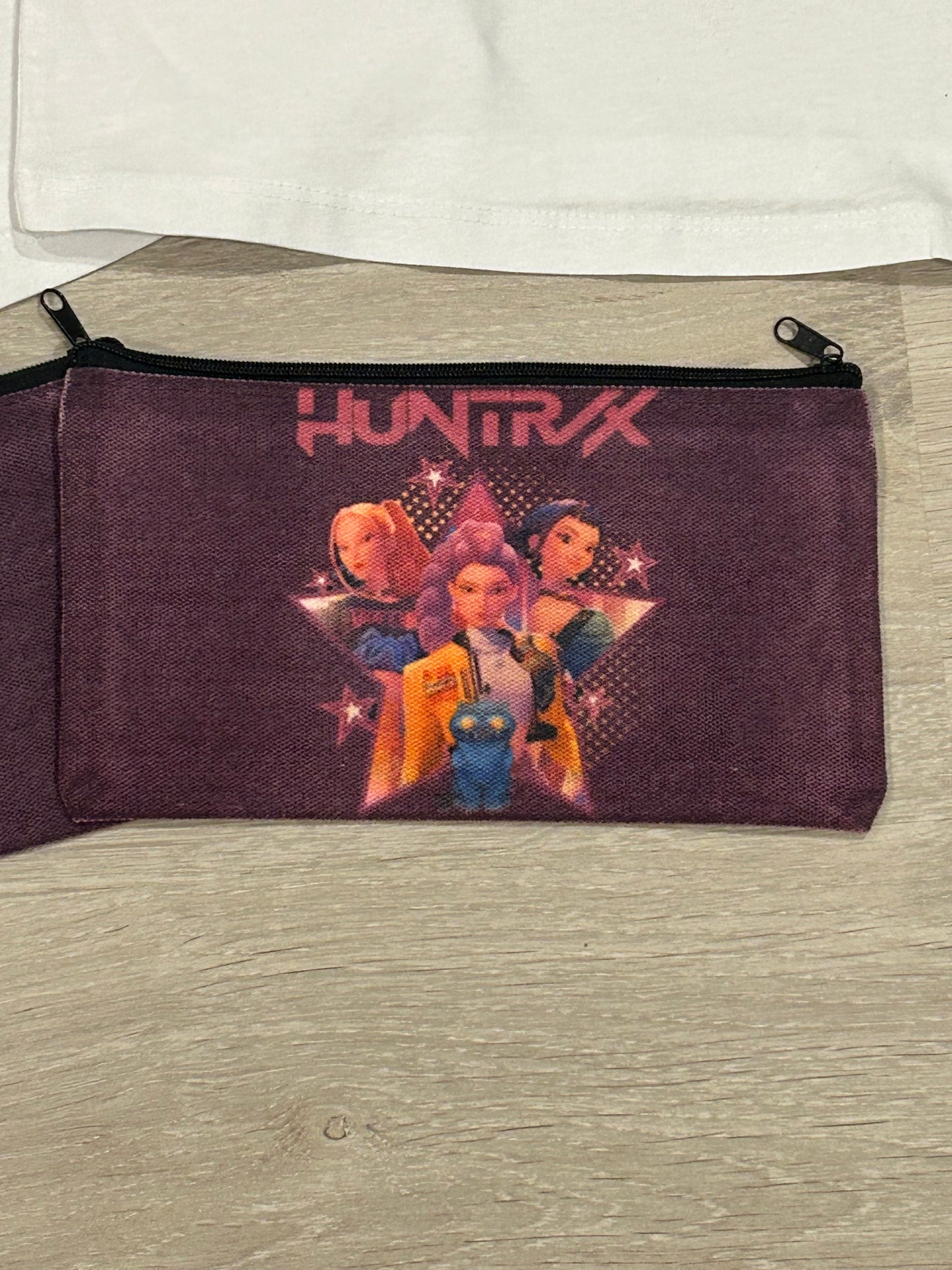 2x shirts and 2x pencil cases
