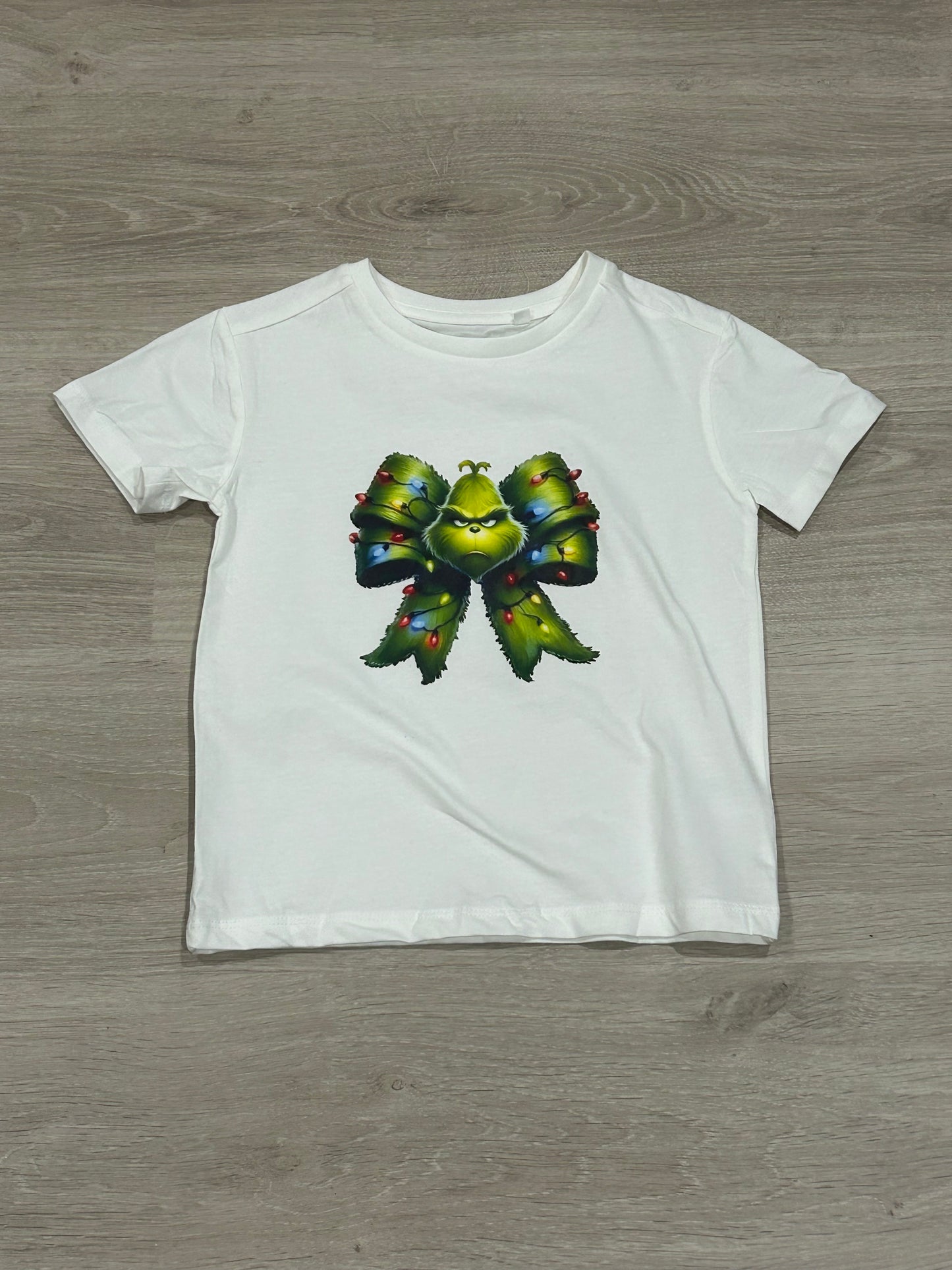 The Grinch bow shirt