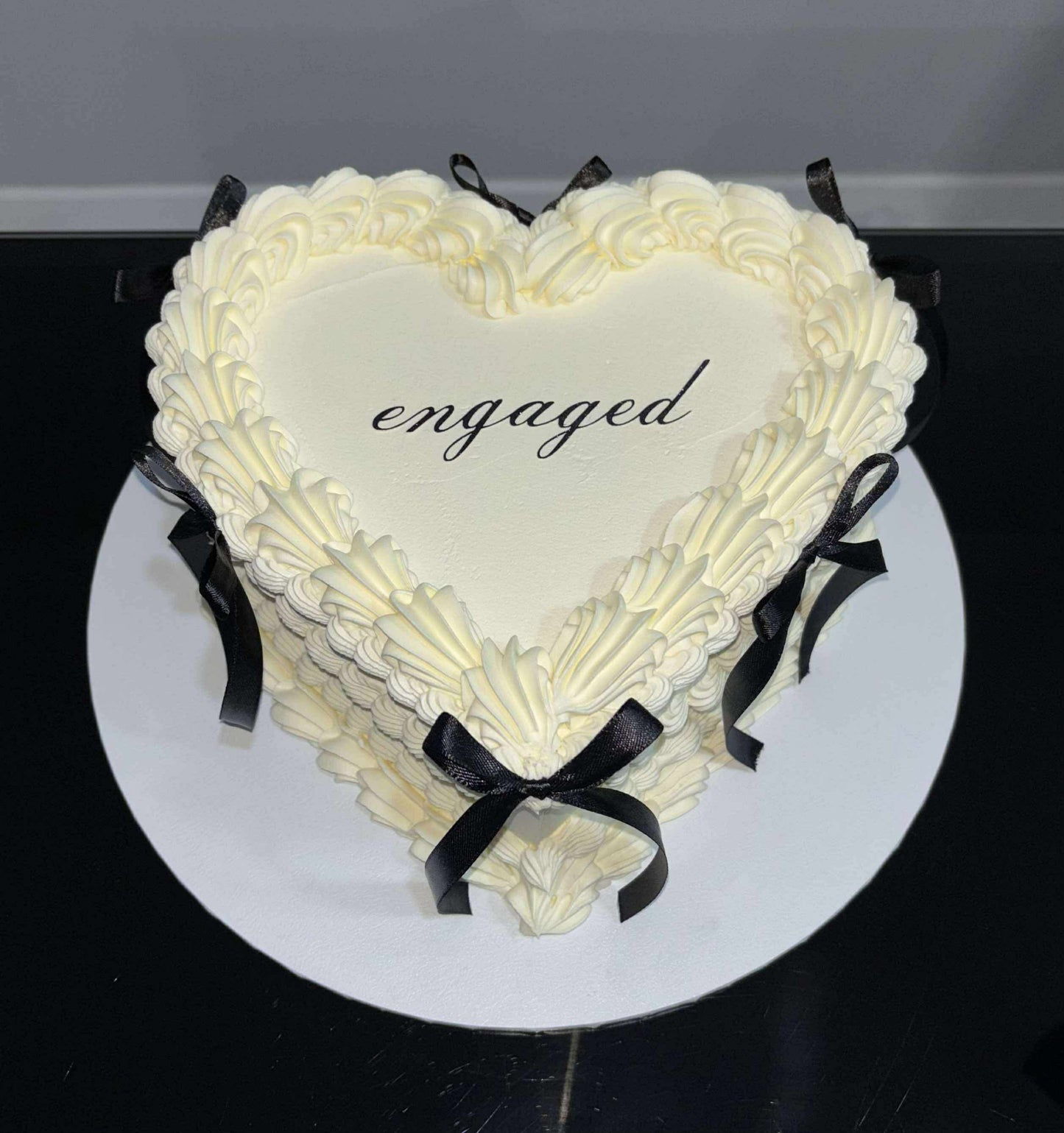 “Engaged” cake topper